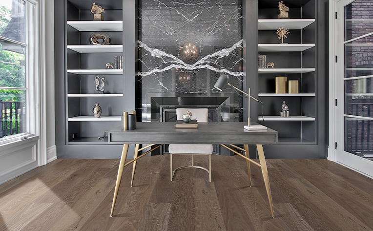 dark wide plank hardwood flooring in modern monochromatic home office
